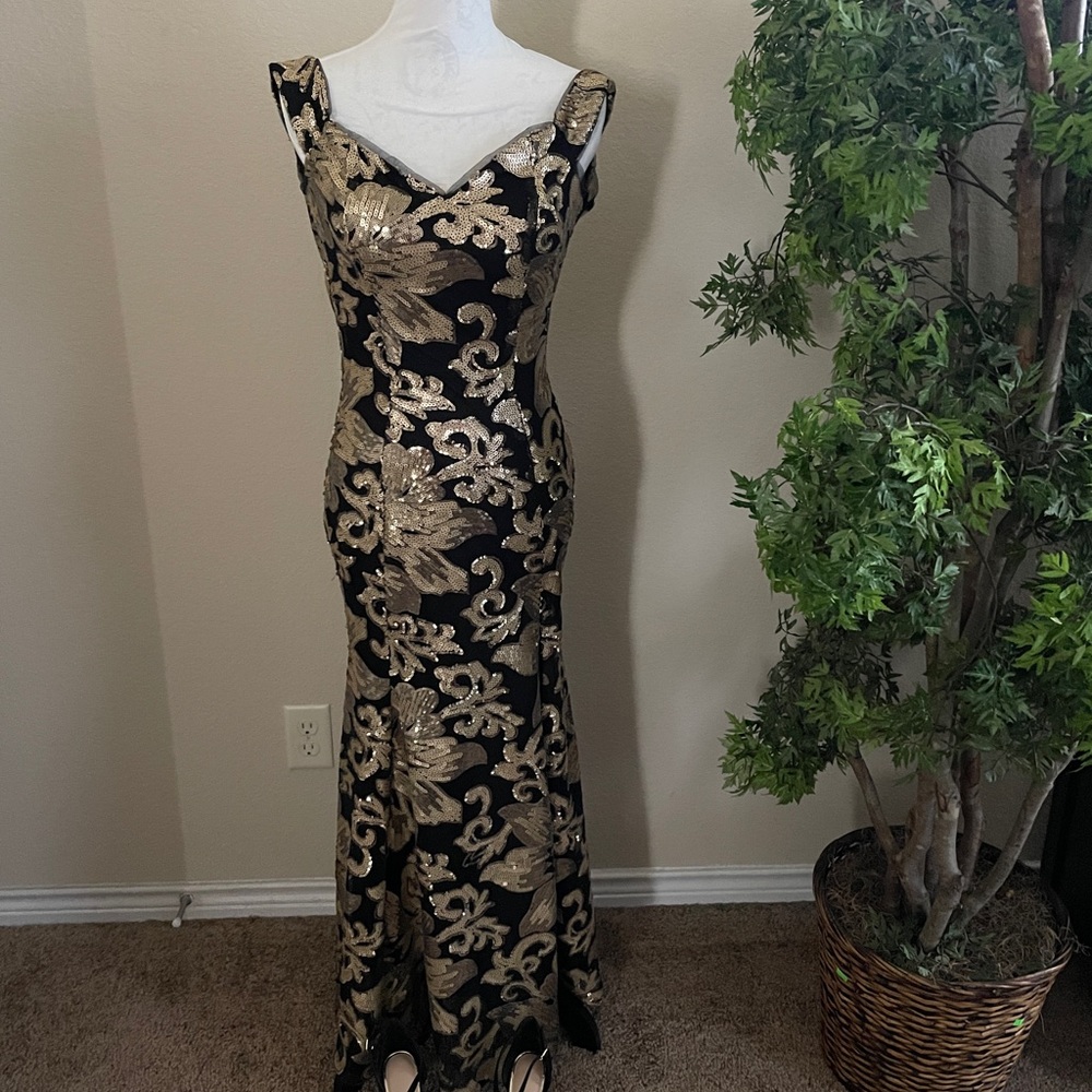 Black and gold sequin gown.